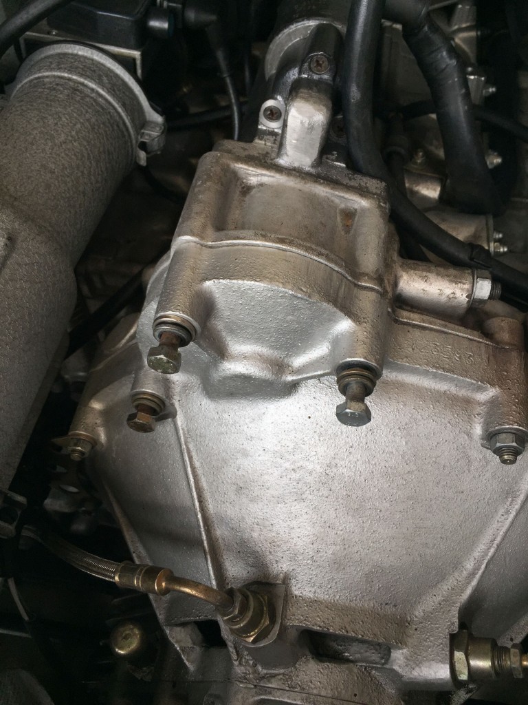 Remove these three bolts to free the starter.