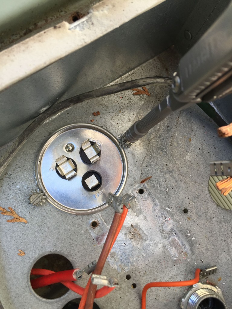 Securing the new capacitor.