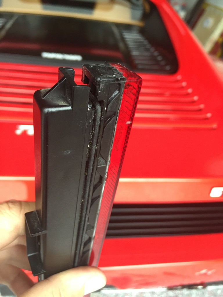 How the lens cover separates from the housing.