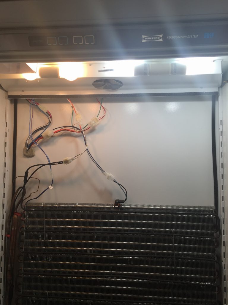 Traditional 40W "warm" appliance bulbs on the left, 10W LED "cool" bulbs on the right