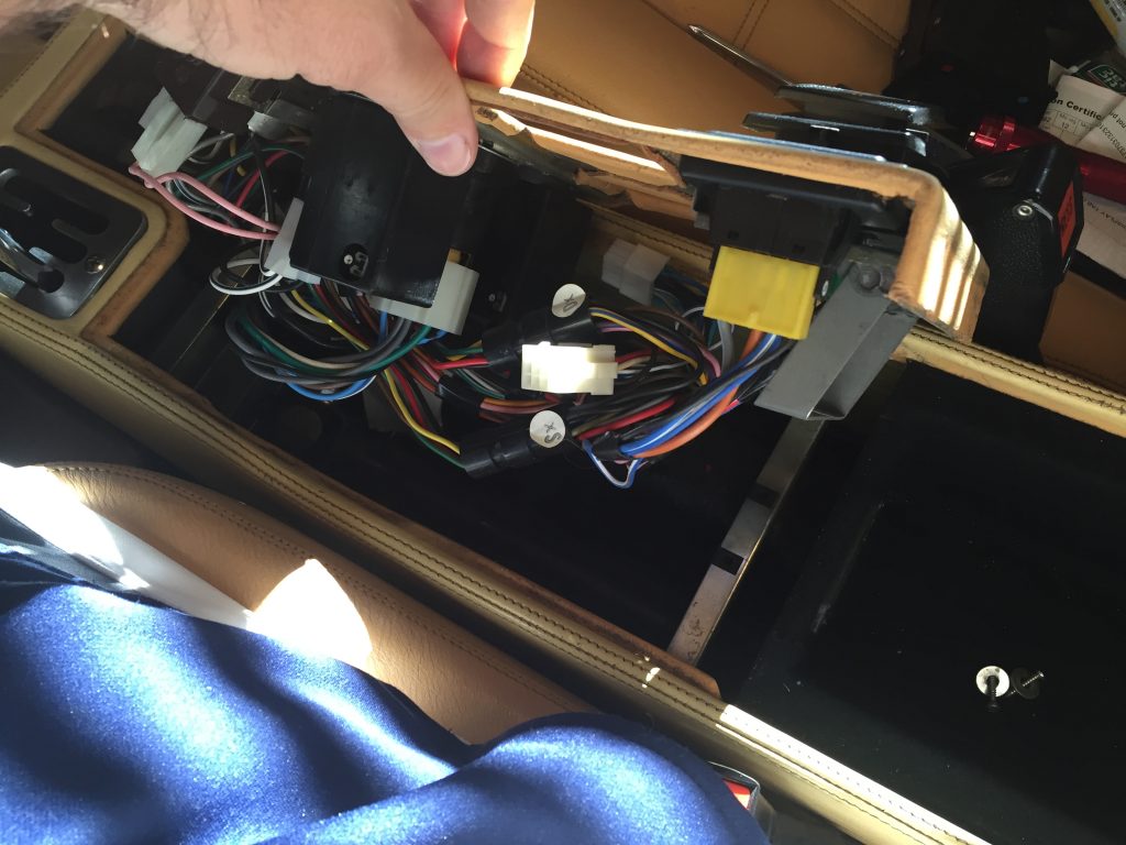 Center console wiring exposed