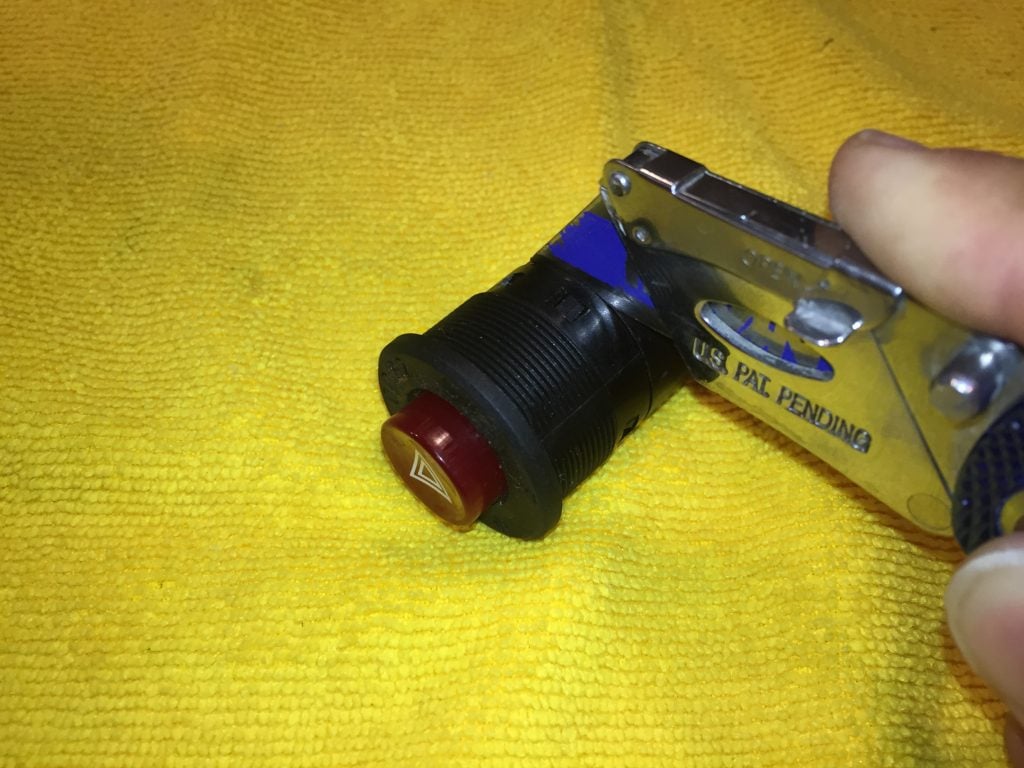 Use a utility knife to pry apart the switch