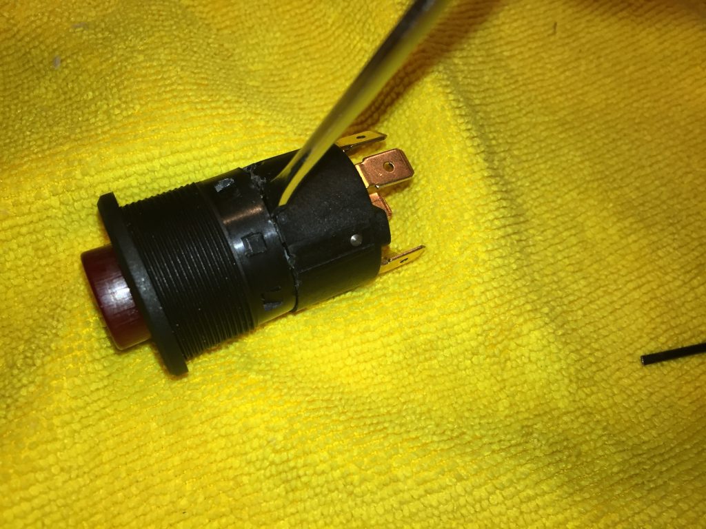 A small flat-head screwdriver can help pop the switch apart