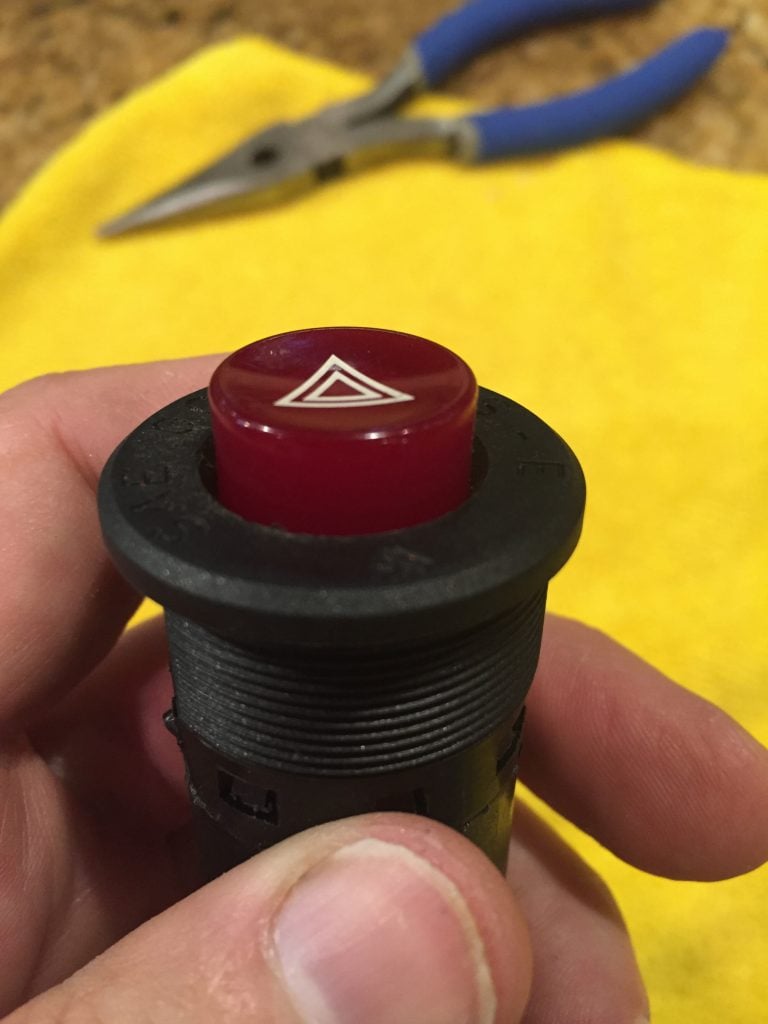 Ferrari 328 hazard button in the up position